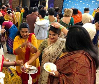 BAGA_touching the flame_crop 340 290.jpg